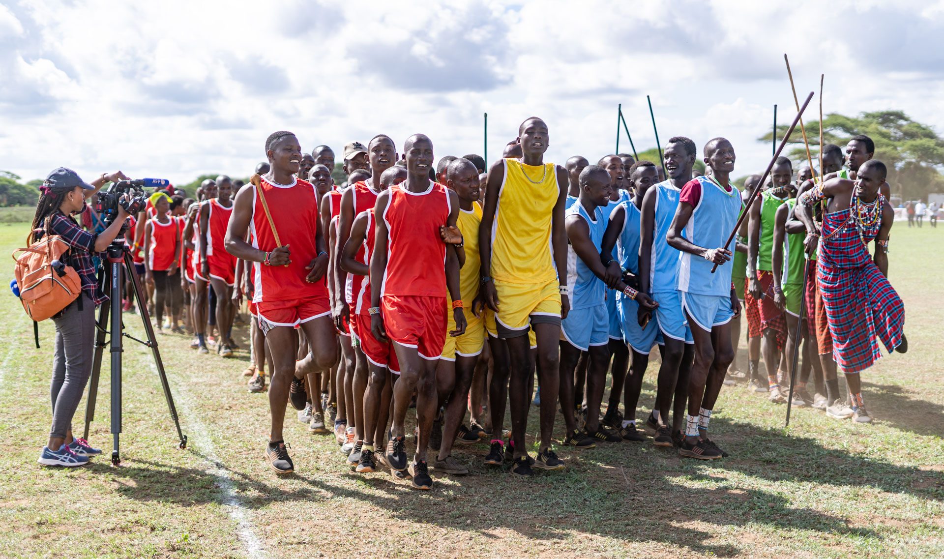 Above: The teams take the field for the opening ceremonies
